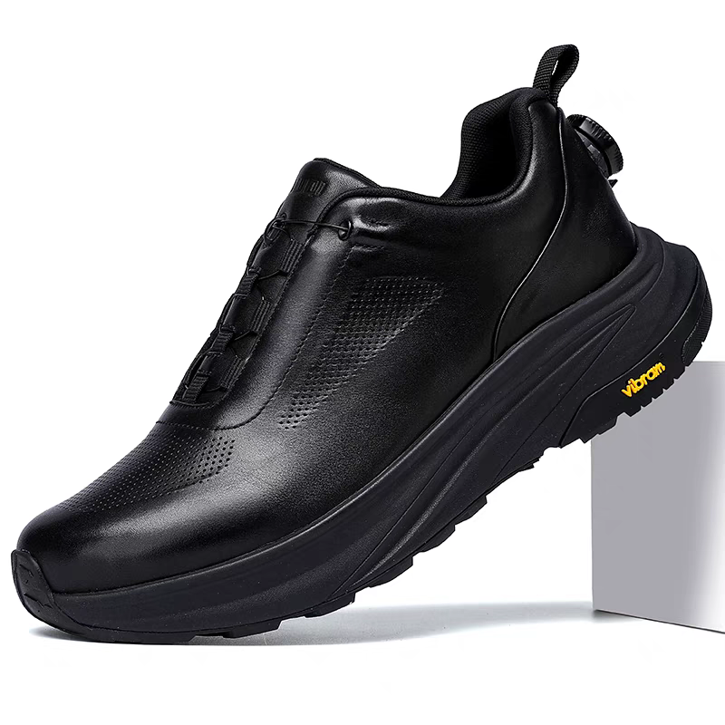 Neue Laufschuhe aus schwarzem Leder mit dicker Sohle und drehbarem Knopf 